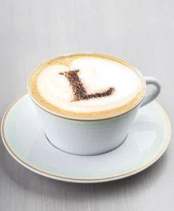 A classic cappuccino with a frothy layer of milk foam on top.