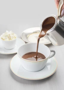 A cup of dark, rich, and velvety hot chocolate.