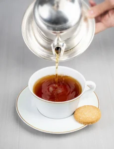 A cup of green tea with a blend of exotic spices and floral notes.