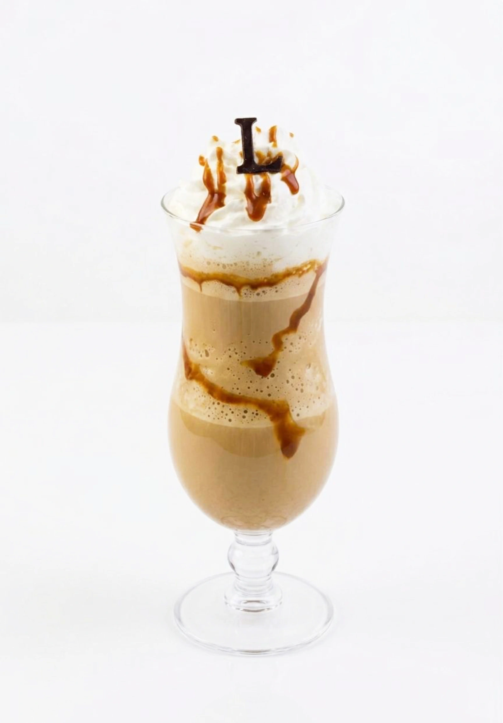 Ladurée Caramel Frappe with whipped cream and caramel drizzle
